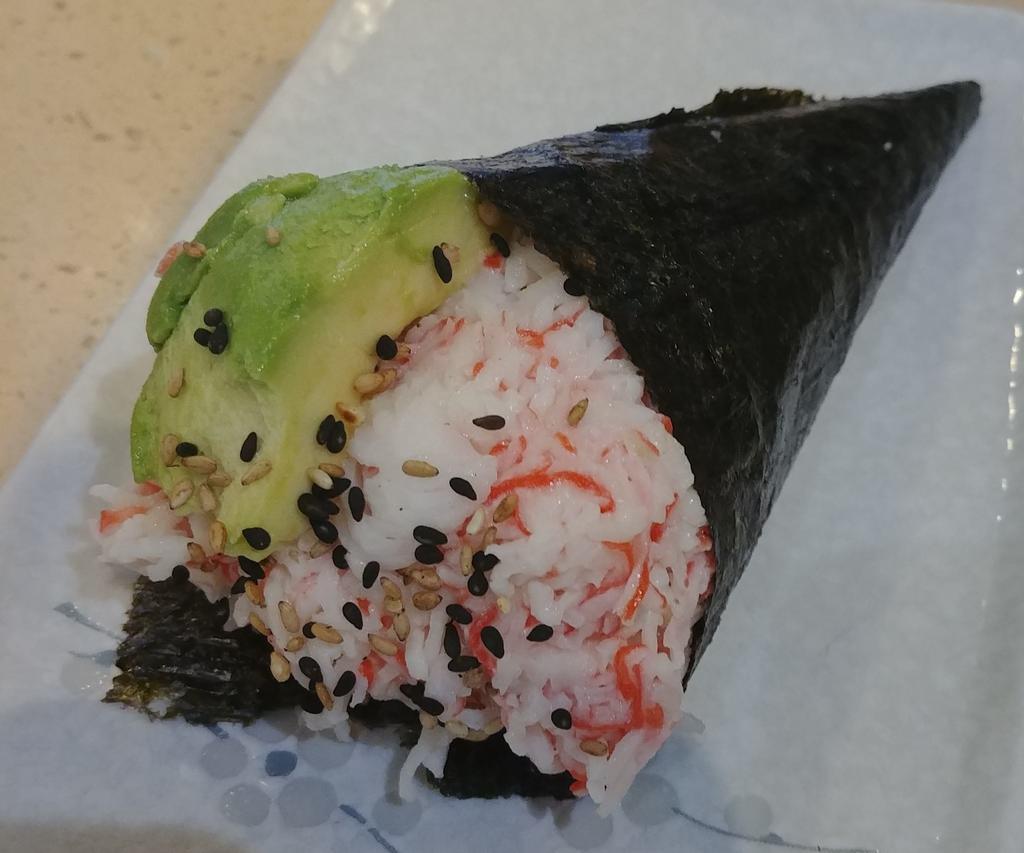 California Hand Roll · Crab, avo, sushi rice, seaweed, sesame seeds.