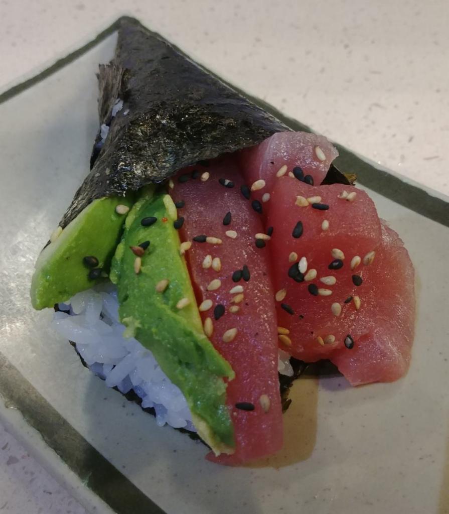 Tuna Hand Roll · Tuna, avocado, sushi rice, seaweed, sesame seeds.