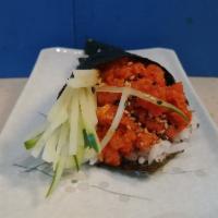 Spicy Tuna Hand Roll · Spicy tuna, cucumber, sushi rice, seaweed, sesame seeds.