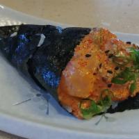 Spicy Hamachi Hand Roll · Spicy hamachi, avocado, sushi rice, seaweed, masago, scallion, spicy mayo sauce, sesame seeds.