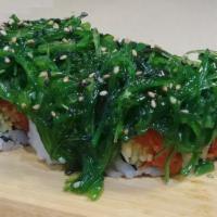 Poki Roll · In: Spicy Tuna, Cucumber
Out: Wakame, Sesame Seeds
Sauce:
