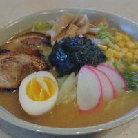 Miso Ramen · Ramen noodles in miso-based broth with 2 pieces chashu (BBQ pork), fish cake, bamboo, half h...