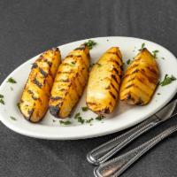 Grilled Potatoes · Cooked on a rack over a grill. 