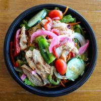 Fajita Salad · Choice of fajita chicken or fajita beef with grilled onions and peppers, topped with queso. ...