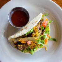 Steak Tacos · Beef tips in mild or spicy Mexicana sauce of roasted tomato, onion, cilantro, and jalapeno s...