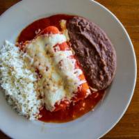 Potosinas Enchiladas · Mild red sauce prepared with roasted tomatoes, fine herbs, and delicious spices. Served in c...