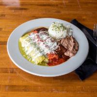 Tres Marias Enchiladas · 3 traditional sauces (mole, green and ranchera). Served in corn tortillas and topped with mo...
