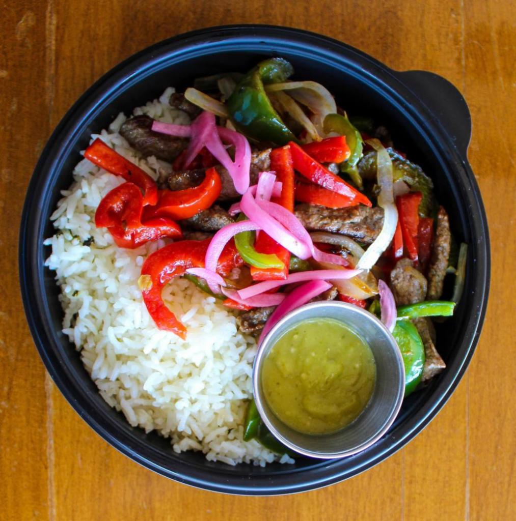Fajita Bowl · Choice of fajita chicken or fajita beef with grilled onions and bell peppers. Served with a spicy avocado-tomatillo sauce.