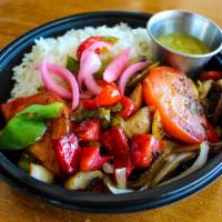 Veggie Rice Bowl · Grilled mushrooms, onions, zucchini, squash, and bell peppers. Served with a spicy avocado-t...