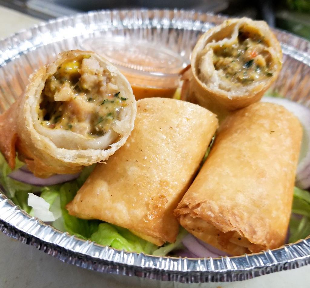 Southwestern Chicken Egg Rolls · Chicken, beans, corn, onion, spinach, jalapeno and cheese.