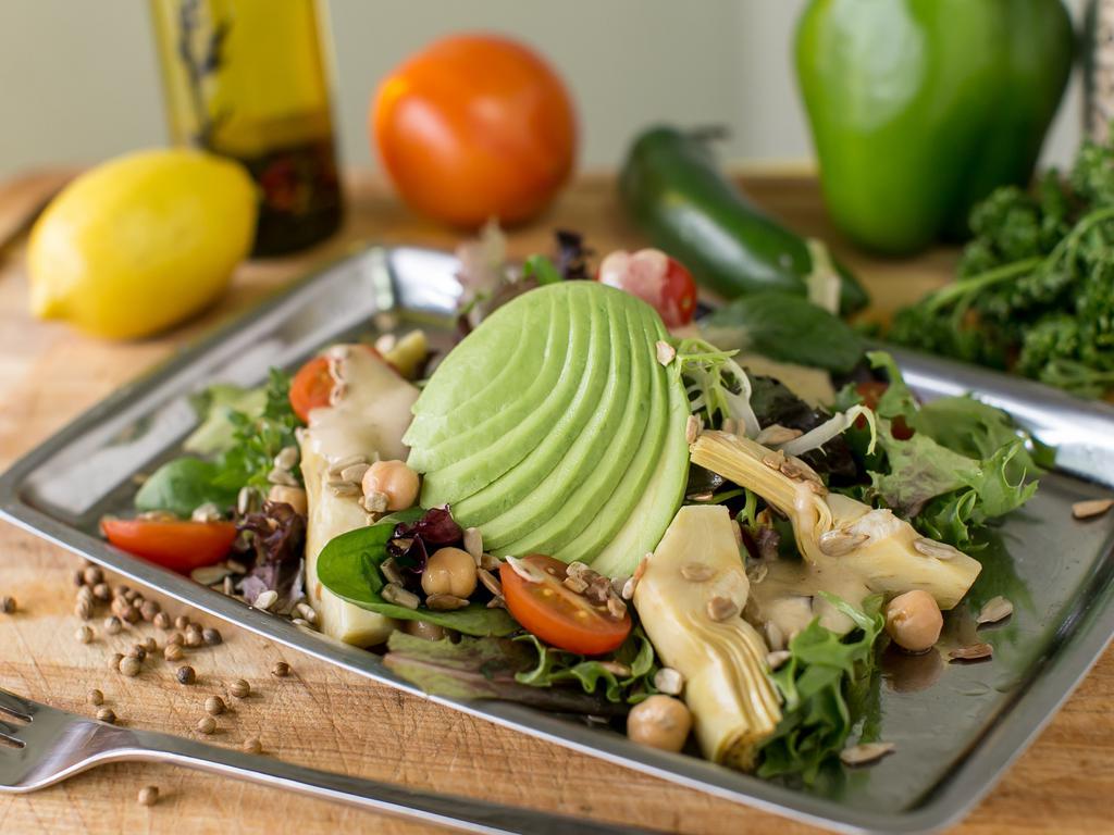 Zuzu's Salad · Spring Mix, Avocado, Cherry Tomatoes, Artichoke, Chickpeas, Roasted Sunflower Seeds, Italian Vinaigrette