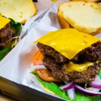 Cheese Burger · 2 handmade Beef patties, Cheddar cheese, Lettuce, Tomato, Onions, Pickles