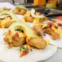 Shrimp Tacos · Avocado, pico de gallo, lettuce and boom boom sauce.