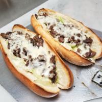 Francisville Flank · Toasted Amoroso bread roll, Flank Steak, Mozzarella, Lettuce, Garlic Mayo