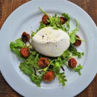 Burrata Tricolore · Creamy, decadent 4oz. Burrata served on a bed of arugola seasoned with our balsamic reductio...