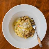 Duck Ragu' · Rich and fragrant. The duck is first roasted then braised in its own reduction with a hint o...