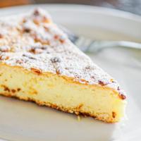 Torta della Nonna · A slice of Tuscan indulgence, with a sweet pastry base giving way to lemon- and vanilla-scen...