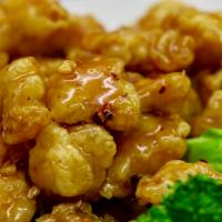 General Tso's Chicken · With white rice. Containing crabmeat is imitation crab. Spicy.
