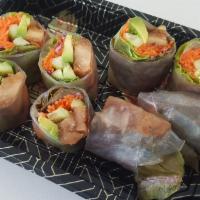 Teriyaki chicken Spring Roll · (fully cooked)
Rice paper, teriyaki chicken, avocado, carrot, cucumber, lettuce, red cabbage.