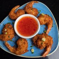 Coconut Shrimp · 6 pieces of coconut encrusted shrimp, served with a sweet chili sauce.
