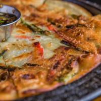 Scallion Pancake · Traditional korean scallion pancake with red bell pepper and scallion shoots, served with a ...
