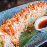 Snow Mountain Roll · Crab meat, tobiko, avocado, bacon crumbles and sweet chili aioli.