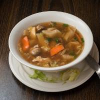 Assorted Wonton Soup · A unique blend of wontons, chicken, beef, shrimp, mushrooms, napa cabbage, and carrots. Incl...
