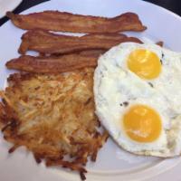 2 Eggs Breakfast · Served with choice of bacon, ham or sausage.