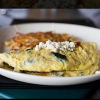Greek Omelette · Spinach, sun-dried tomatoes, roasted bell peppers, kalamata olives and feta cheese, scramble...