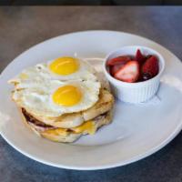 Croque Madame · Grilled ham and Swiss cheese sandwich on toasted sourdough bread with a rosemary aioli and t...