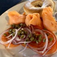 Lox and Bagel · Smoked salmon, capers, tomatoes and red onions, with a bagel and cream cheese.