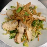 Chinese Chicken Salad · Crisp romaine lettuce, grilled chicken breast, celery and a toasted sesame dressing topped w...