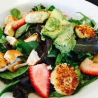 Macadamian Nut and Goat Cheese Salad · Chicken, mixed greens topped with avocado, strawberries and warm goat cheese rolled in macad...