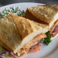 Salmon Sandwich Lunch · Grilled salmon, lettuce, tomato, red onion and mayo on a French roll.