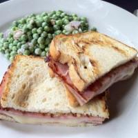 Croque Monsieur Sandwich Lunch · Grilled ham and Swiss cheese on sourdough with a rosemary aioli.