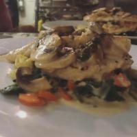 Chicken Piccata Lunch · Grilled chicken breast served with garden vegetables and a mushroom and caper beurre blanc s...
