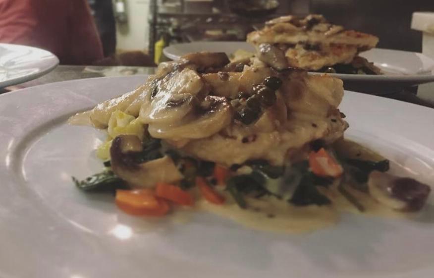 Chicken Piccata Lunch · Grilled chicken breast served with garden vegetables and a mushroom and caper beurre blanc sauce.