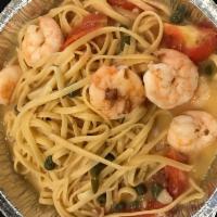 Shrimp Scampi Pasta · Sauteed shrimp, tomatoes and capers, in a white wine lemon sauce over linguini.