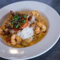 Shrimp Diablo · Sauteed shrimp in a spicy chili garlic sauce served over basmati rice and a grilled tomato.