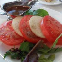 Beefsteak Tomatoes and Georgia Onions Salad · Served with steak sauce.