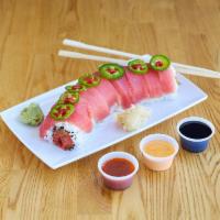 Poki Bomb Roll · In: spicy tuna, cucumber
Out: tuna, jalapeno