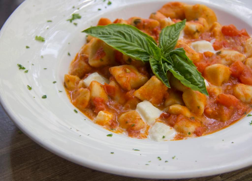 Gnocchetti Sorrentina · Soft Homemade Potato Dumpling, Chopped Fresh Mozzarella, and Fresh Tomato Sauce