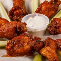 8 Chicken Wings · Prepared plain, mild or spicy. Served with choice of ranch or bleu cheese dressing.