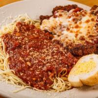 Chicken Parmesan · Paneed and topped with Italian cheese and red gravy. Served over angel hair with a side sala...