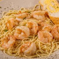 Shrimp Scampi · Our own recipe freshly prepared with real butter, garlic, and herbs. Served over angel hair ...