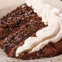 Blackout Chocolate Cake · Chocolate decadence. Prepared with rich creamy chocolate filling. Topped with a chocolate dr...
