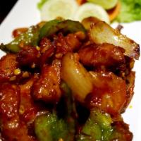 Gobi Manchurian  · Deep Fried Cauliflower mixed with Green pepper, Red Pepper, onion, tomato in Spicy sauce