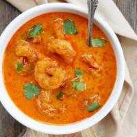 Shrimp Curry · Shrimp Marinated with Nepali spice and cooked with Onion and tomato gravy,  