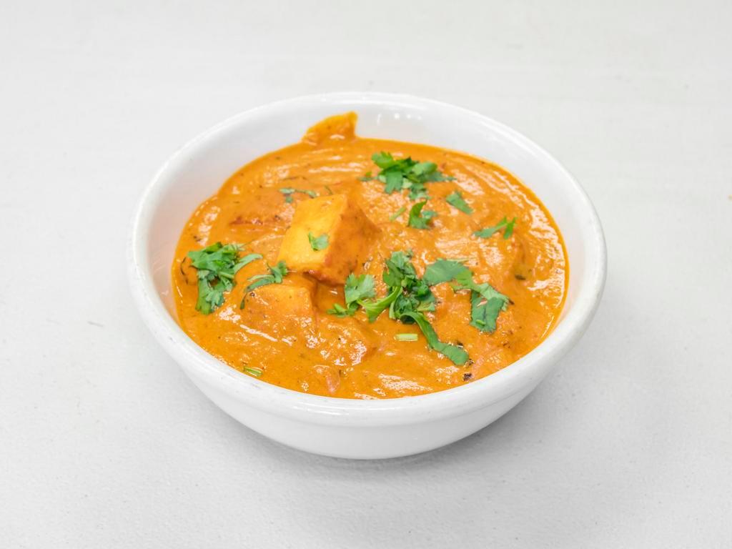 Paneer Masala · Cottage Cheese cooked in creamy tomato base sauce with onion, peppers, tomato and Nepali spices 