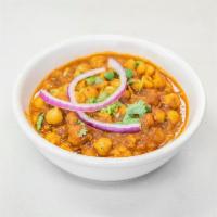 Chana Masala · Choley masala. A delicious variety of chick peas, onions, tomatoes cooked in rich onion sauc...